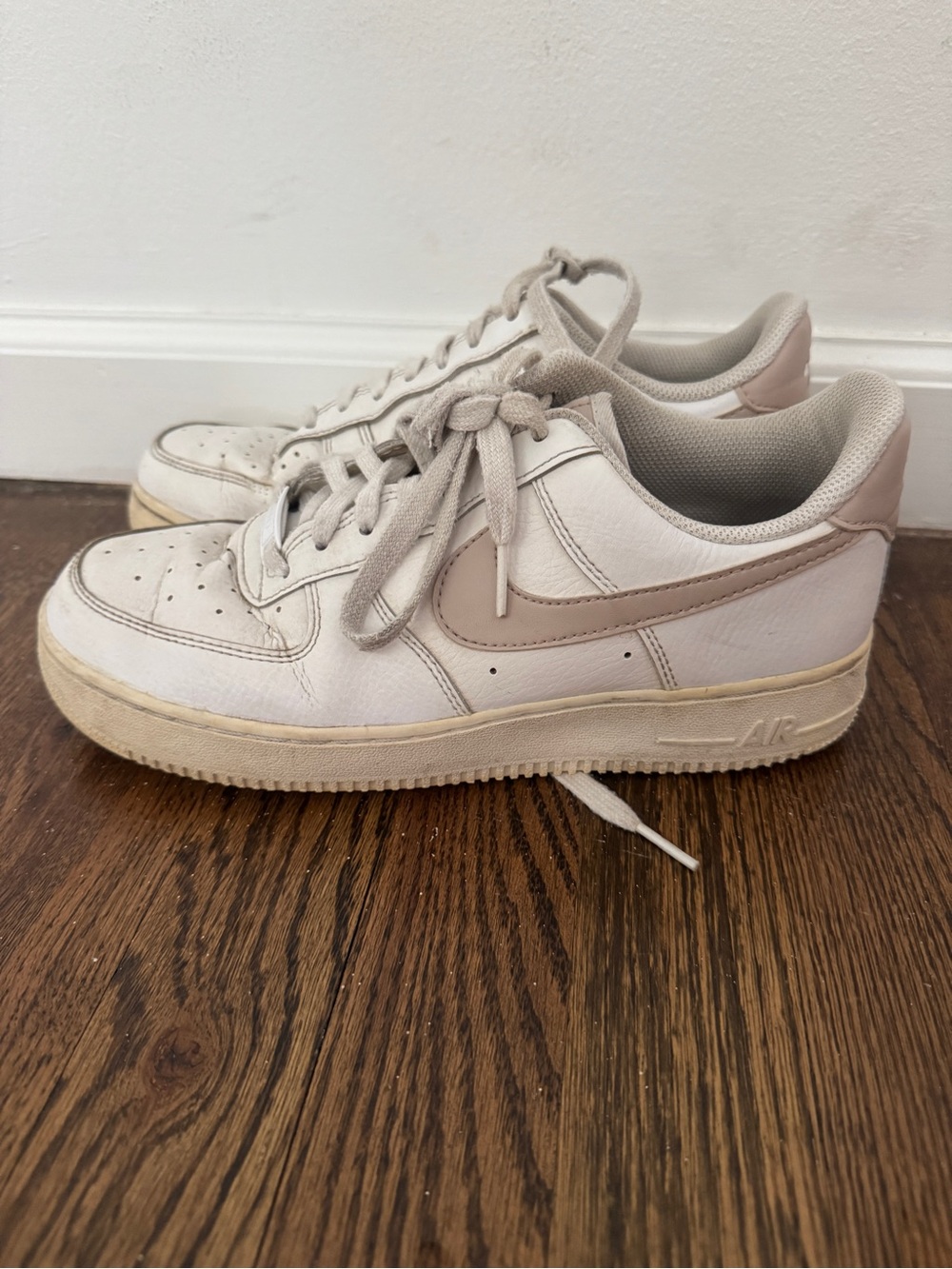 Nike air white sneakers with pink swoosh